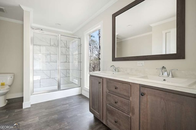 626 Candy Ln, Ellijay, GA 30540 - full bathroom with crown molding, a shower stall, double vanity, and wood finished floors