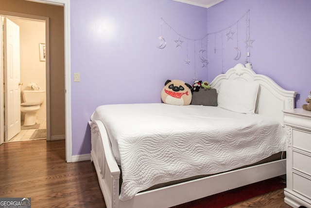 321 N Grove Blvd, Kingsland, GA 31548 - bedroom featuring dark wood finished floors and crown molding
