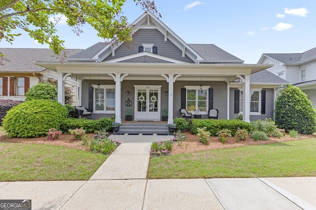 5841 Choctaw Ln, Braselton, GA 30517 - view of front of home with covered porch, a shingled roof, and a front yard