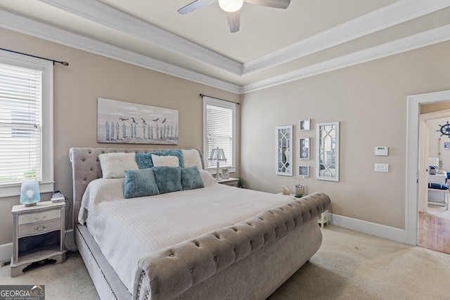 5841 Choctaw Ln, Braselton, GA 30517 - bedroom with carpet flooring, baseboards, a ceiling fan, crown molding, and a tray ceiling