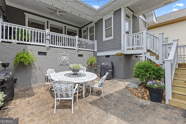 5841 Choctaw Ln, Braselton, GA 30517 - view of patio with stairway, grilling area, and outdoor dining area
