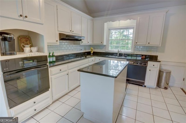 5208 Fox Hill Ct, Peachtree Corners, GA 30092 - kitchen featuring black appliances, under cabinet range hood, white cabinets, tasteful backsplash, and a center island