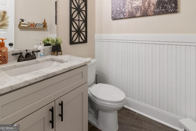 461 Preakness Way, Forsyth, GA 31029 - bathroom featuring vanity and a wainscoted wall