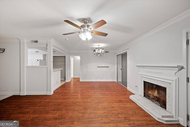 5400 Roswell Rd Unit L3, Sandy Springs, GA 30342 - unfurnished living room featuring a ceiling fan, a chandelier, a high end fireplace, ornamental molding, and wood finished floors