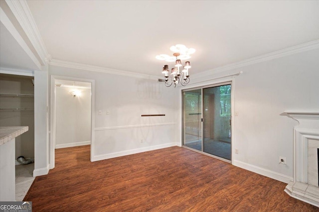 5400 Roswell Rd Unit L3, Sandy Springs, GA 30342 - unfurnished dining area featuring crown molding, a chandelier, and wood finished floors