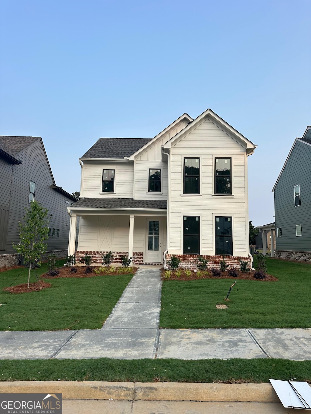 3482 Adler Trl, Buford, GA 30519 - view of front of property with brick siding and a front yard