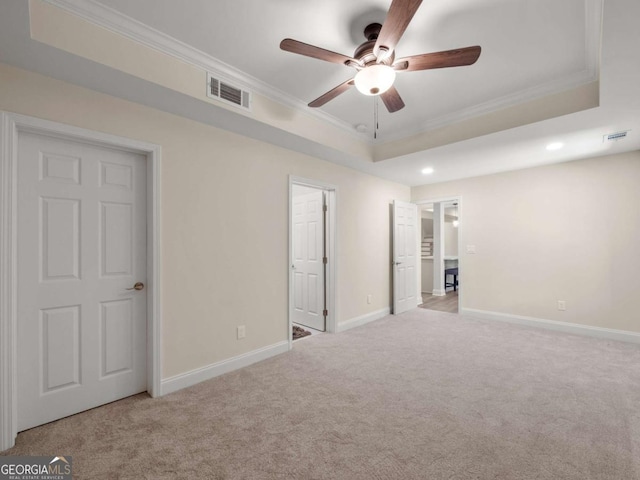 unfurnished bedroom featuring visible vents, recessed lighting, ornamental molding, and carpet flooring