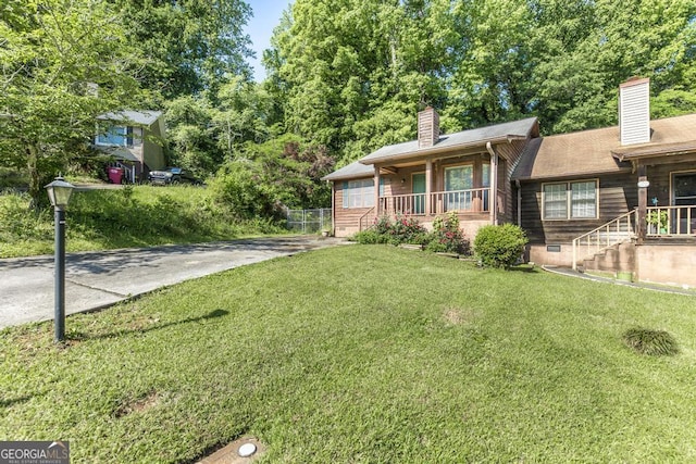410 Steeplechase, Macon, GA 31204 - exterior space featuring a lawn, a chimney, and crawl space