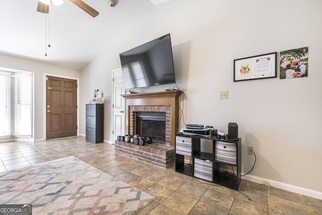 410 Steeplechase, Macon, GA 31204 - living room with stone finish flooring, a brick fireplace, baseboards, a ceiling fan, and lofted ceiling