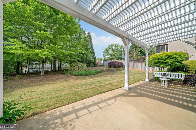 view of patio / terrace with fence and a pergola