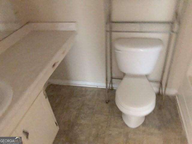 2617 Terrace Pkwy, Morrow, GA 30260 - bathroom with tile patterned floors, toilet, and baseboards
