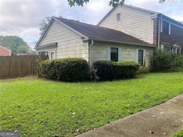 2617 Terrace Pkwy, Morrow, GA 30260 - view of side of property with a lawn and fence