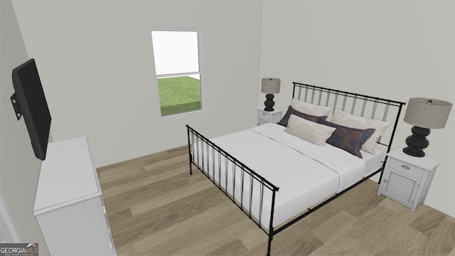 bedroom featuring light wood-style flooring