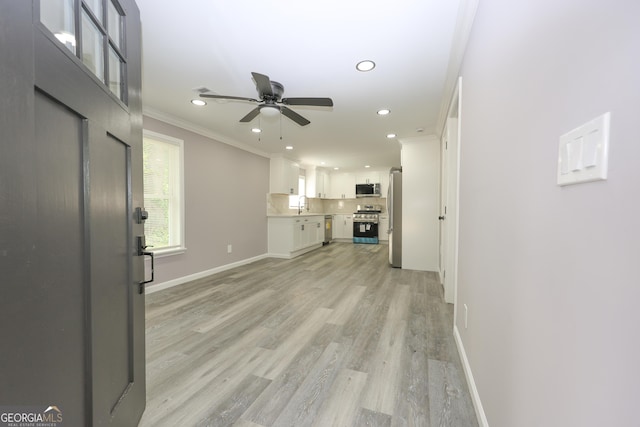 938 Motley St, Lagrange, GA 30241 - unfurnished living room with recessed lighting, ornamental molding, baseboards, light wood-type flooring, and a ceiling fan