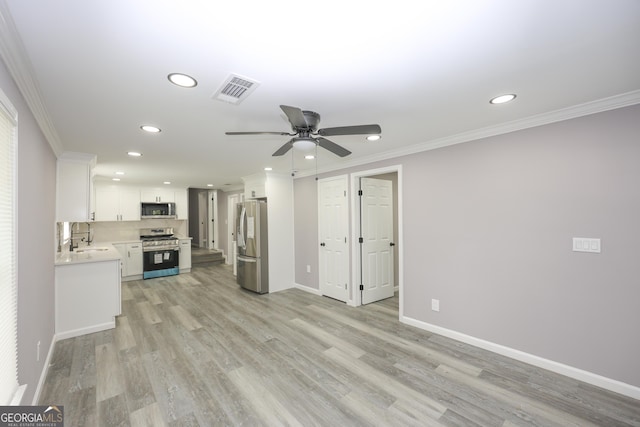 938 Motley St, Lagrange, GA 30241 - unfurnished living room featuring ornamental molding and recessed lighting