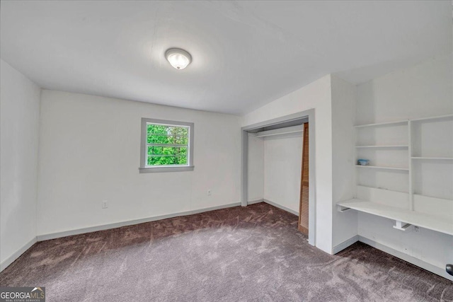 376 Mauldin Rd, Thomaston, GA 30286 - unfurnished bedroom with baseboards, carpet floors, and a closet
