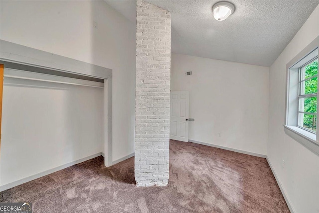 376 Mauldin Rd, Thomaston, GA 30286 - unfurnished bedroom featuring a textured ceiling, carpet flooring, and baseboards