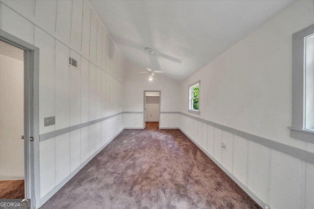 376 Mauldin Rd, Thomaston, GA 30286 - carpeted empty room with visible vents, a ceiling fan, and vaulted ceiling