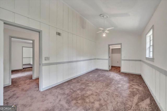 376 Mauldin Rd, Thomaston, GA 30286 - carpeted spare room featuring visible vents, a ceiling fan, and vaulted ceiling