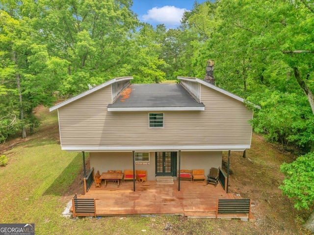 376 Mauldin Rd, Thomaston, GA 30286 - back of property with an outdoor living space, a yard, a deck, stucco siding, and french doors