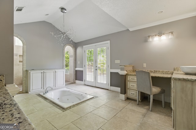 15635 US Highway 27 N, Hamilton, GA 31811 - full bath featuring vanity, french doors, a jetted tub, lofted ceiling, and visible vents