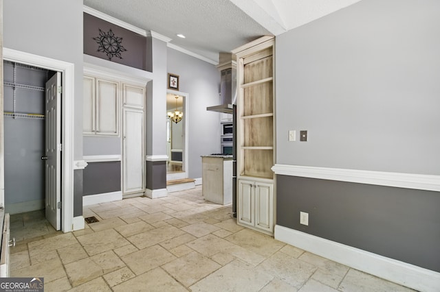 15635 US Highway 27 N, Hamilton, GA 31811 - interior space with stone tile floors, baseboards, an inviting chandelier, and crown molding