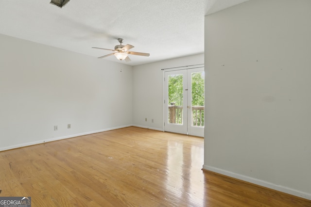 15635 US Highway 27 N, Hamilton, GA 31811 - spare room with light wood-type flooring, baseboards, and ceiling fan