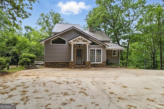 15635 US Highway 27 N, Hamilton, GA 31811 - view of front of property with fence, a chimney, and metal roof