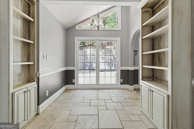 15635 US Highway 27 N, Hamilton, GA 31811 - entryway with baseboards, lofted ceiling, a textured ceiling, and a chandelier