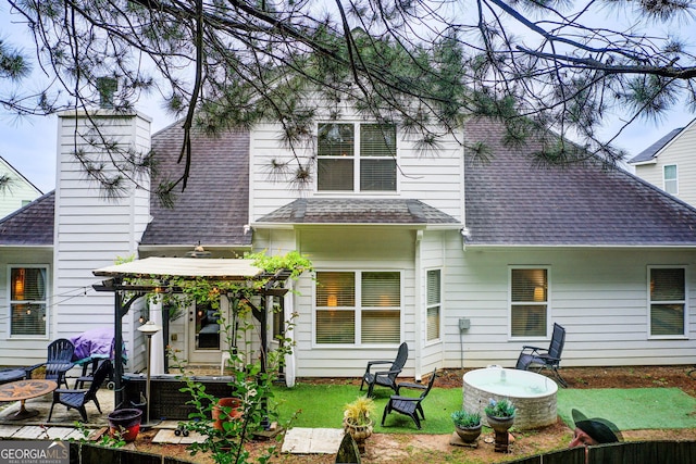 51 Norton Ave, Acworth, GA 30101 - back of property featuring roof with shingles and a chimney