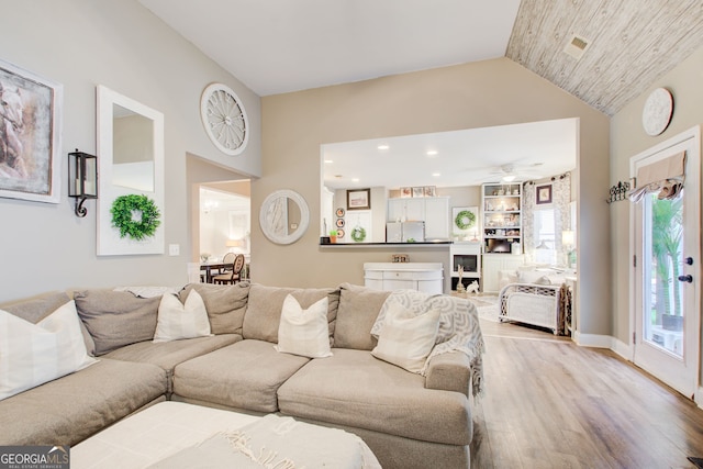 51 Norton Ave, Acworth, GA 30101 - living room with light wood-style flooring, lofted ceiling, and ceiling fan
