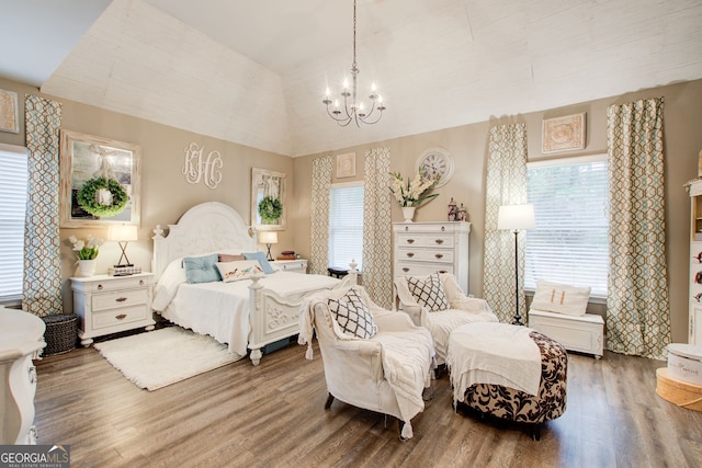 51 Norton Ave, Acworth, GA 30101 - bedroom with a chandelier, vaulted ceiling, and wood finished floors