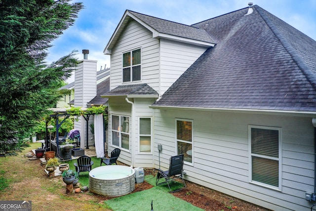 51 Norton Ave, Acworth, GA 30101 - back of house with a shingled roof and a lawn