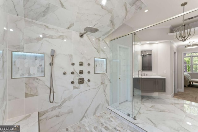 full bath with vanity, a marble finish shower, marble finish floor, visible vents, and ornamental molding