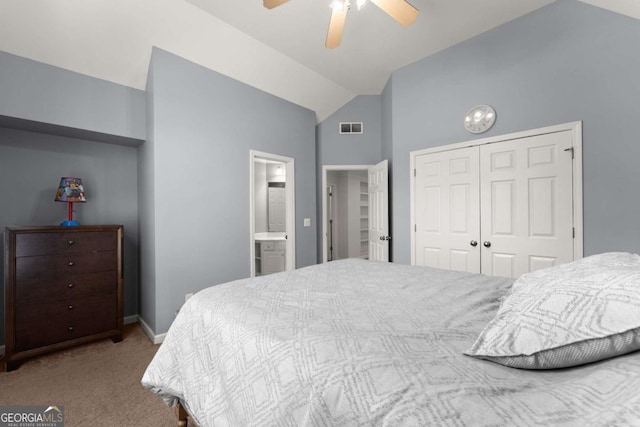 bedroom with visible vents, a closet, a ceiling fan, carpet, and ensuite bath