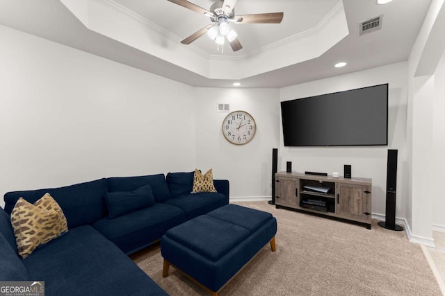 living area with carpet flooring, ceiling fan, recessed lighting, visible vents, and ornamental molding