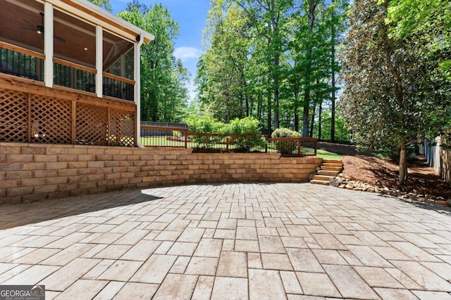 1900 Chattahoochee Run Dr, Suwanee, GA 30024 - view of patio featuring fence and a sunroom
