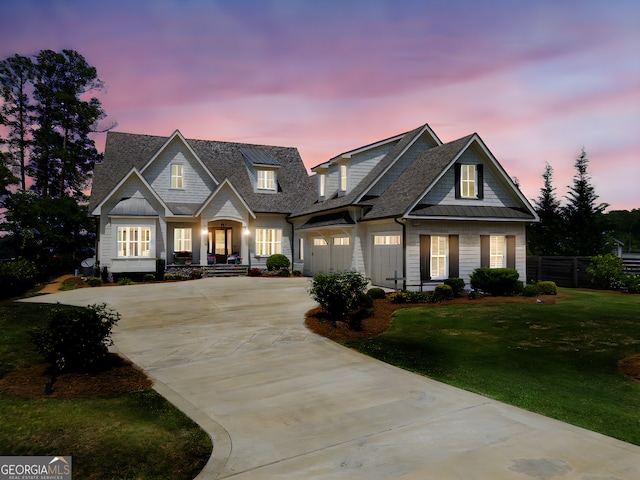 239 Lakeshore Cir, Milledgeville, GA 31061 - craftsman house with a porch, a yard, a standing seam roof, fence, and concrete driveway
