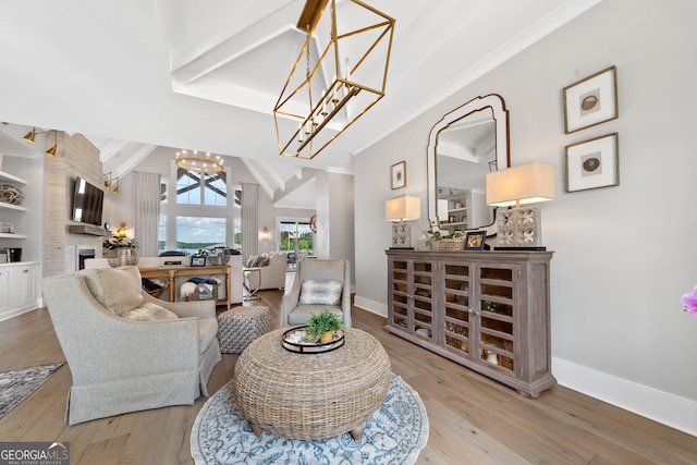 239 Lakeshore Cir, Milledgeville, GA 31061 - living room with baseboards, wood finished floors, and a notable chandelier