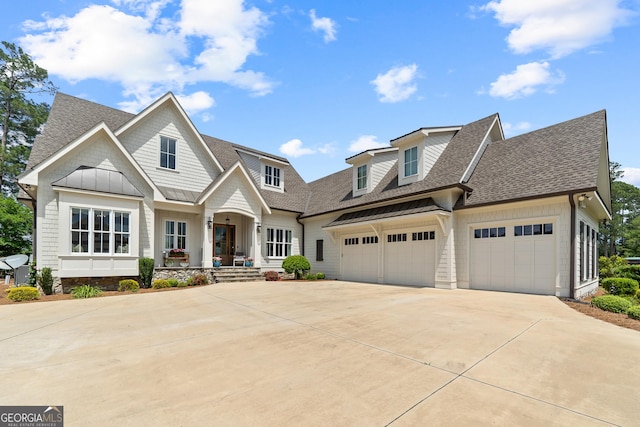 239 Lakeshore Cir, Milledgeville, GA 31061 - craftsman-style house with roof with shingles, concrete driveway, a porch, and an attached garage