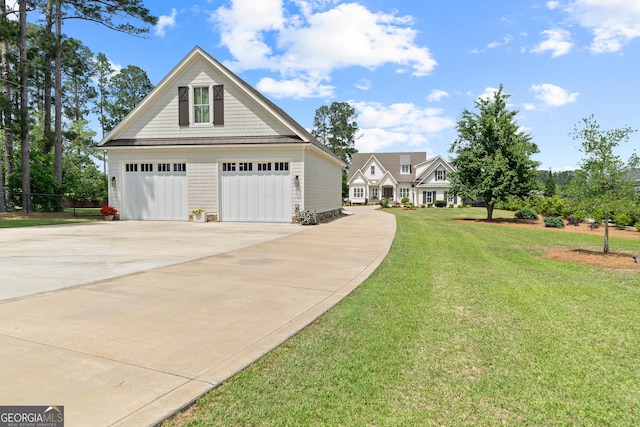 239 Lakeshore Cir, Milledgeville, GA 31061 - exterior space featuring driveway and a yard