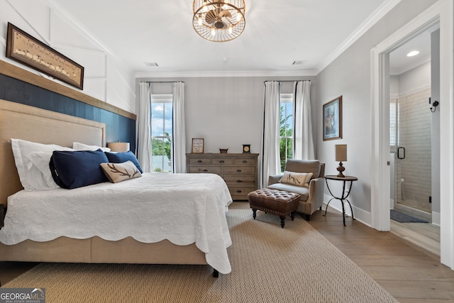 239 Lakeshore Cir, Milledgeville, GA 31061 - bedroom featuring recessed lighting, wood finished floors, ornamental molding, ensuite bathroom, and baseboards