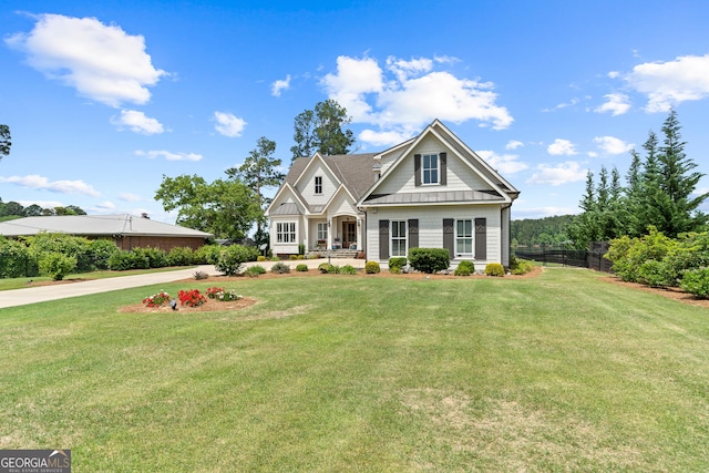 239 Lakeshore Cir, Milledgeville, GA 31061 - craftsman-style house featuring fence and a front lawn