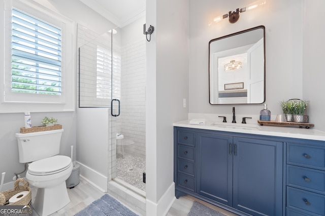 239 Lakeshore Cir, Milledgeville, GA 31061 - full bath featuring a shower stall, baseboards, toilet, wood finished floors, and vanity