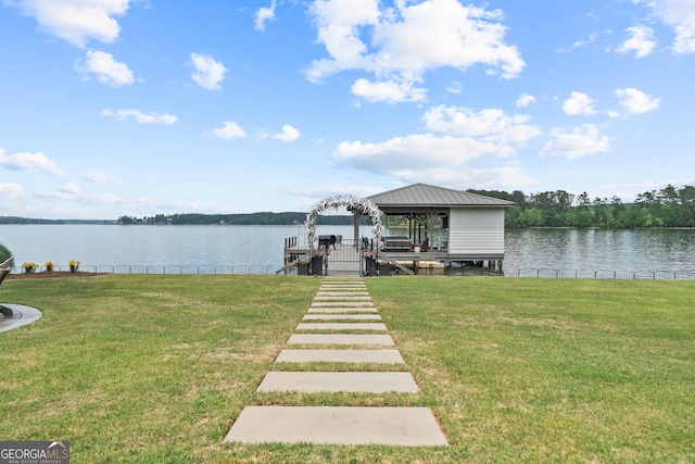 239 Lakeshore Cir, Milledgeville, GA 31061 - dock area featuring a yard, a water view, and boat lift