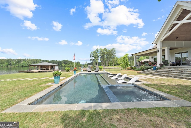 239 Lakeshore Cir, Milledgeville, GA 31061 - outdoor pool with a patio, a water view, and a yard