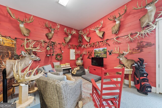 239 Lakeshore Cir, Milledgeville, GA 31061 - interior space with wooden walls and speckled floor