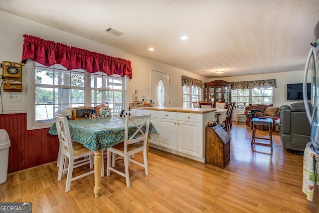 2000 Campbell Rd, Covington, GA 30014 - dining space with light wood-style floors and recessed lighting