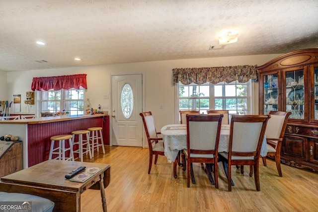 2000 Campbell Rd, Covington, GA 30014 - dining area with light wood finished floors and recessed lighting