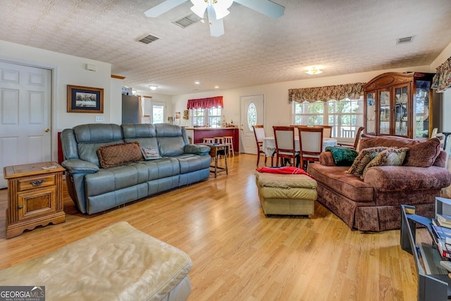 2000 Campbell Rd, Covington, GA 30014 - living area featuring light wood-style floors and a ceiling fan